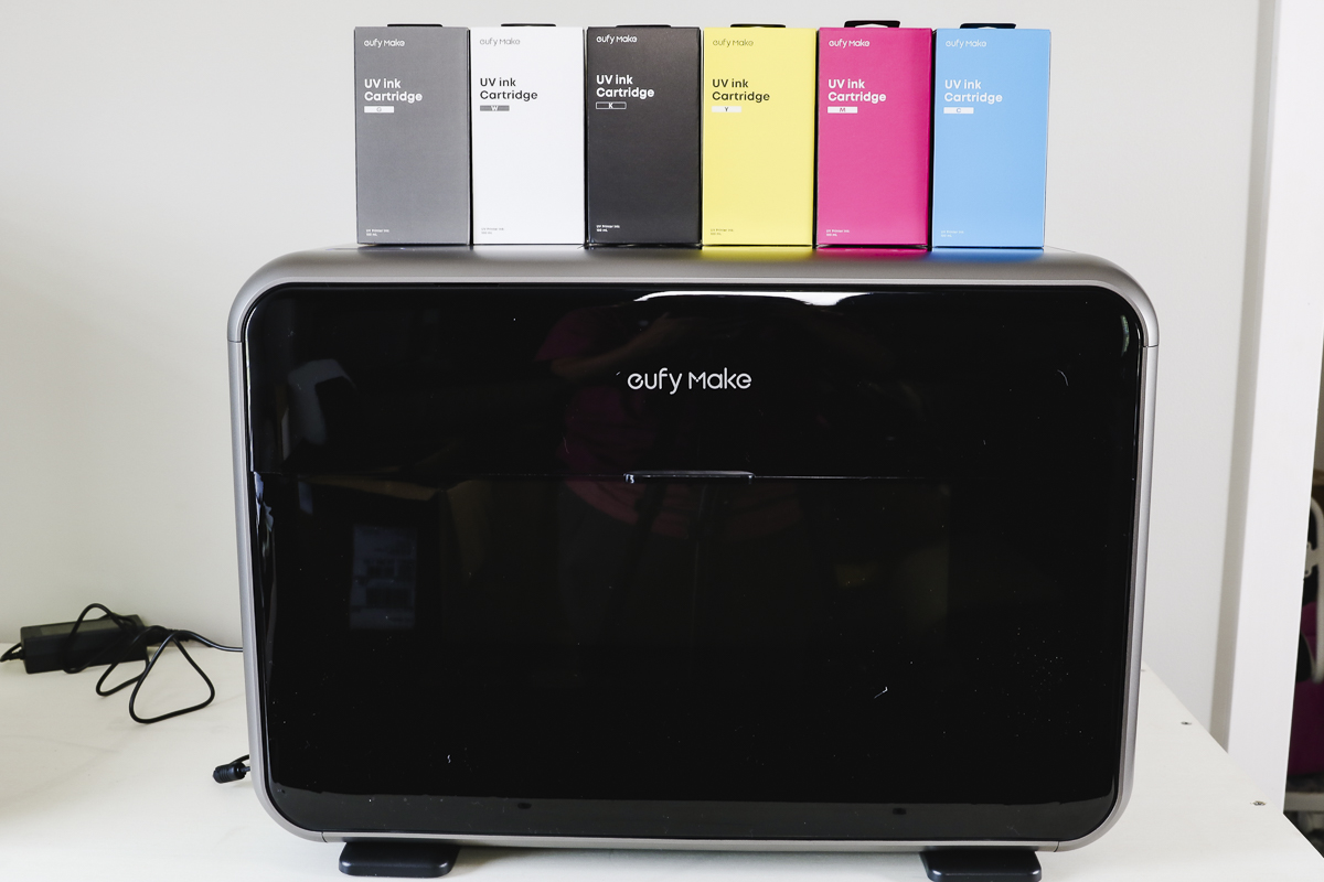 eufyMake E1 printer with ink cartridges.