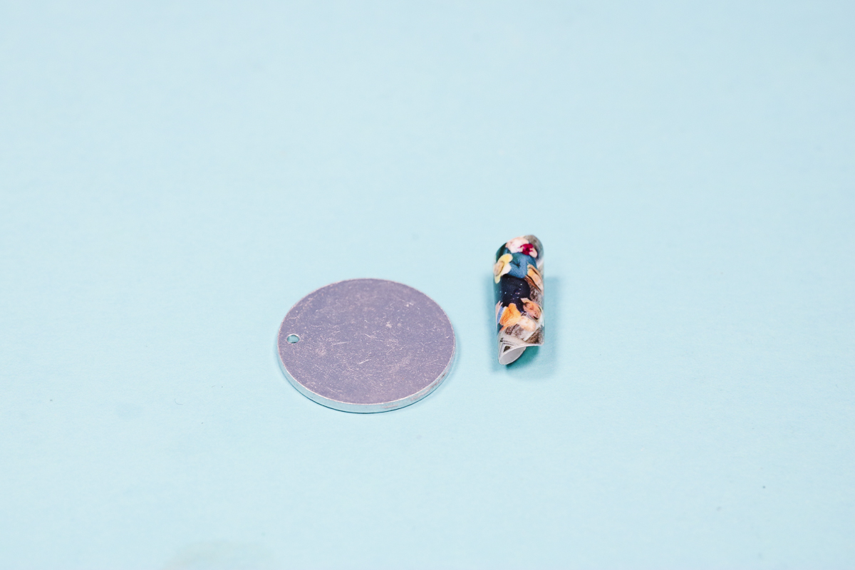 Metal blank with print peeled off.