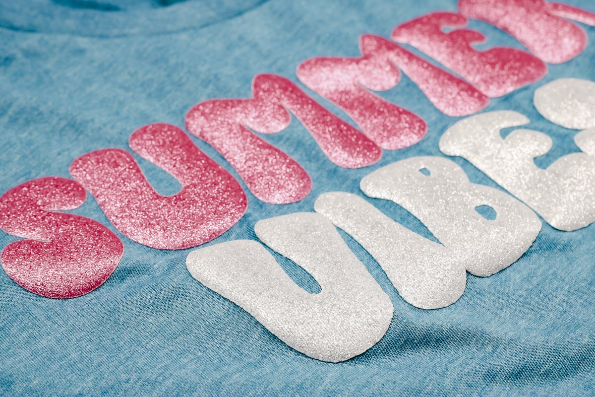 Close up of pink and silver glitter puff HTV.