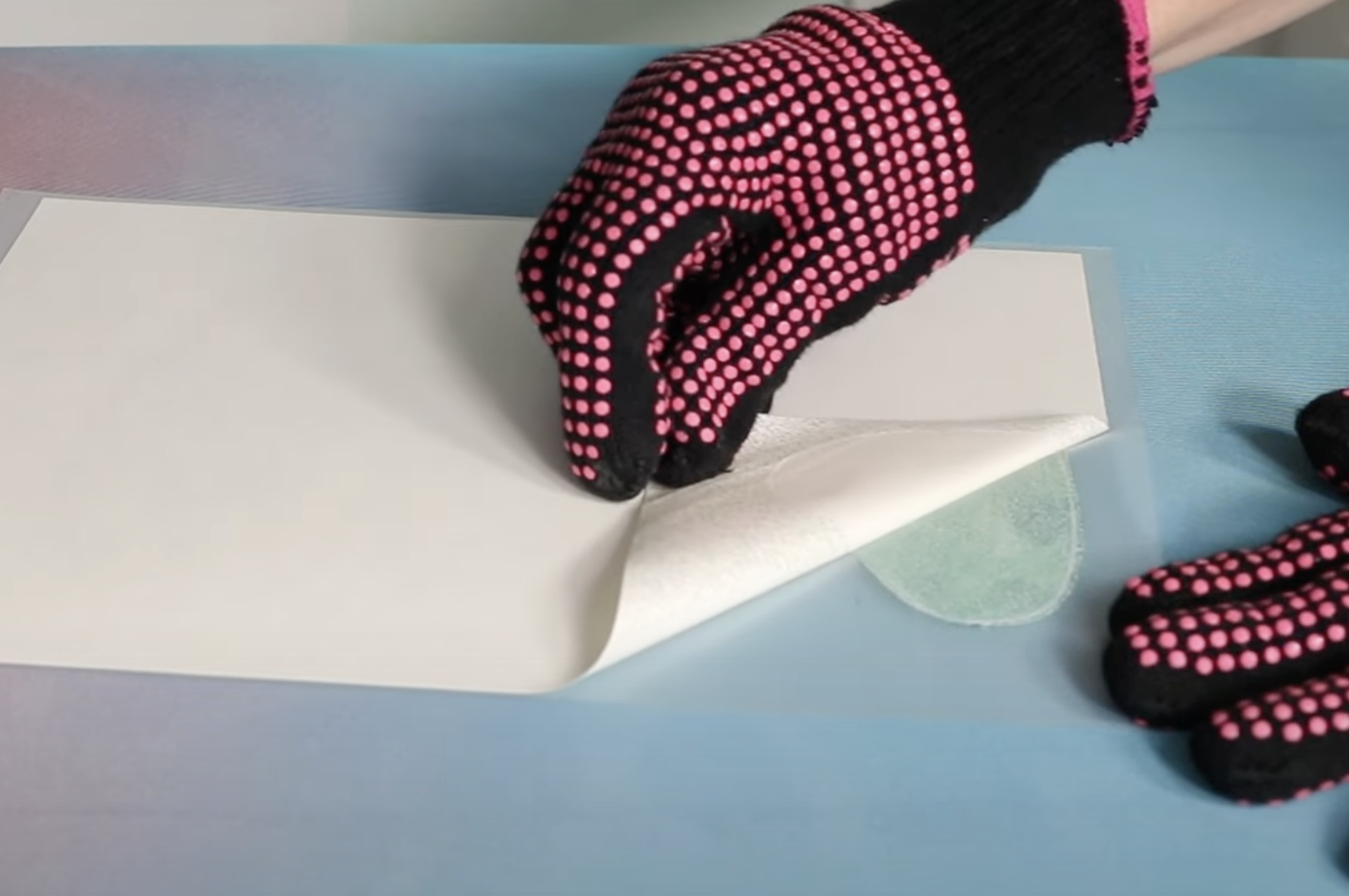 Peel glitter adhesive sheet away from toner print.