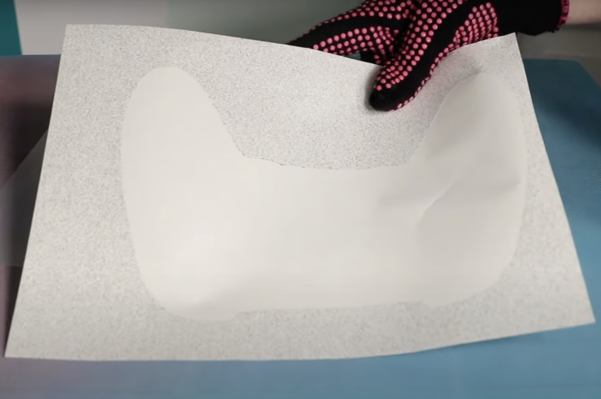 Glitter adhesive sheet with adhesive removed.