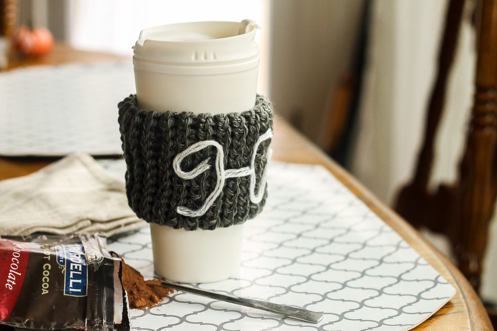 White coffee cup with sleeve