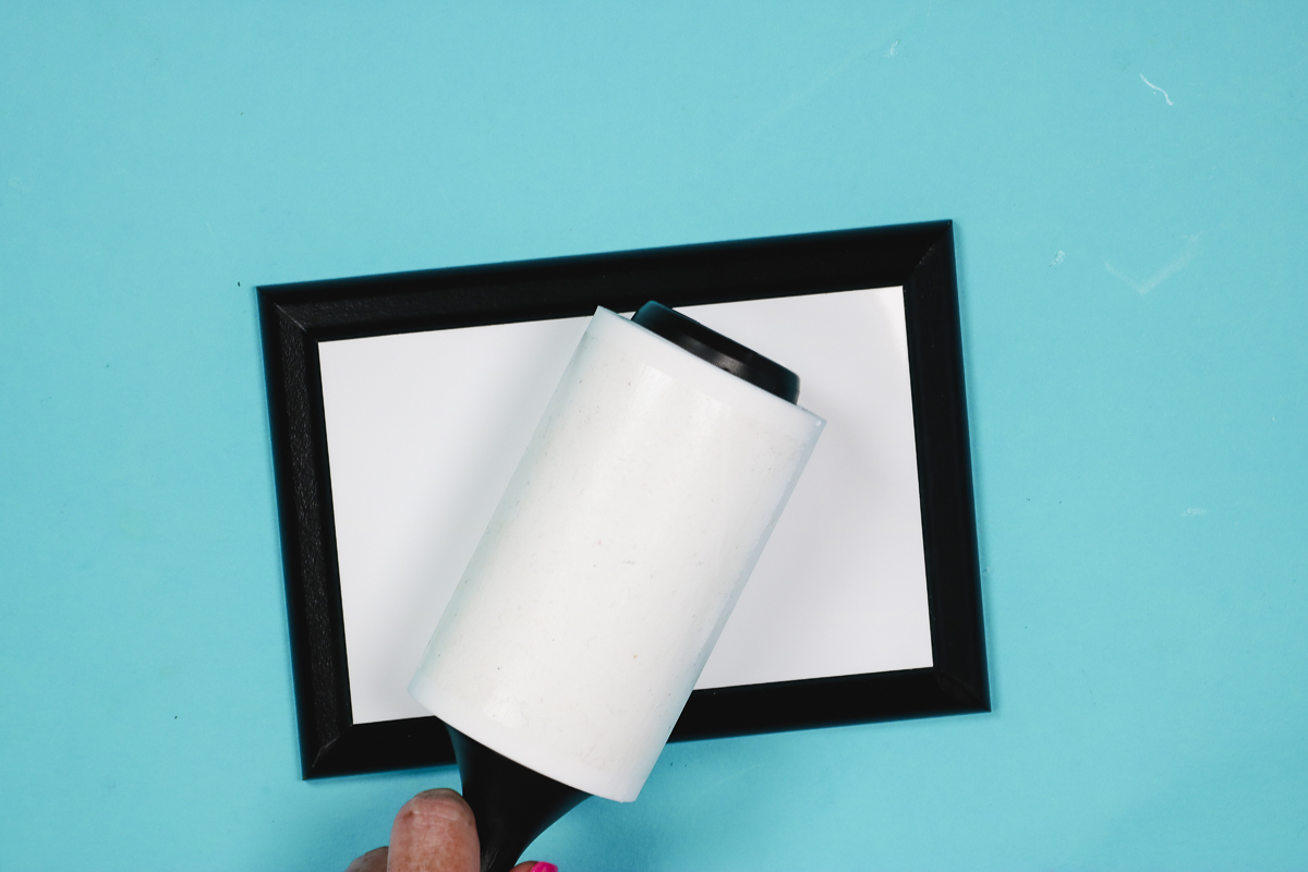 Lint roll surface to clean any dust or debris.