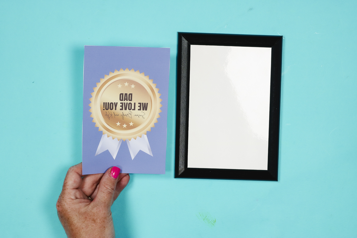 Trim excess paper away from sublimation print.