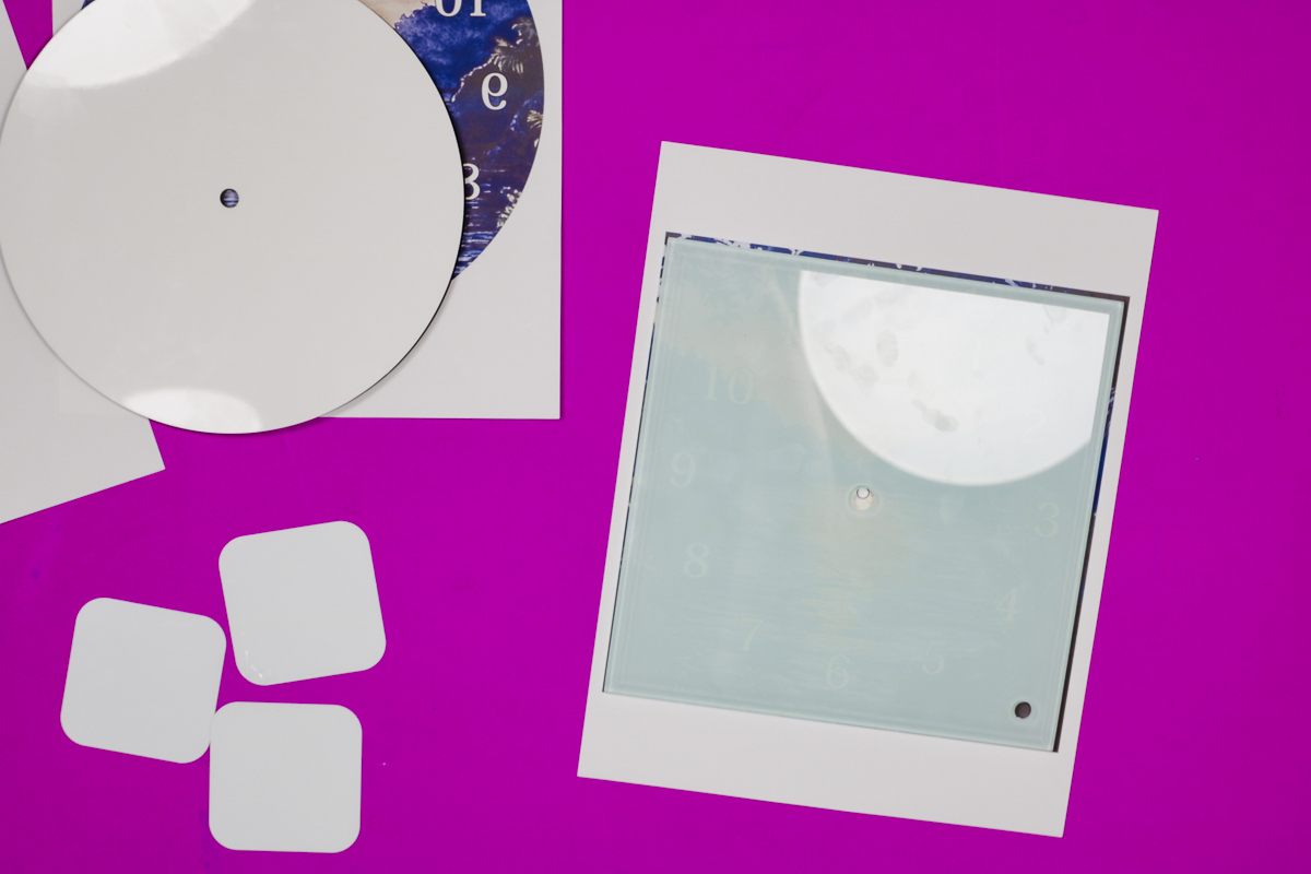 Locate square clock on print.