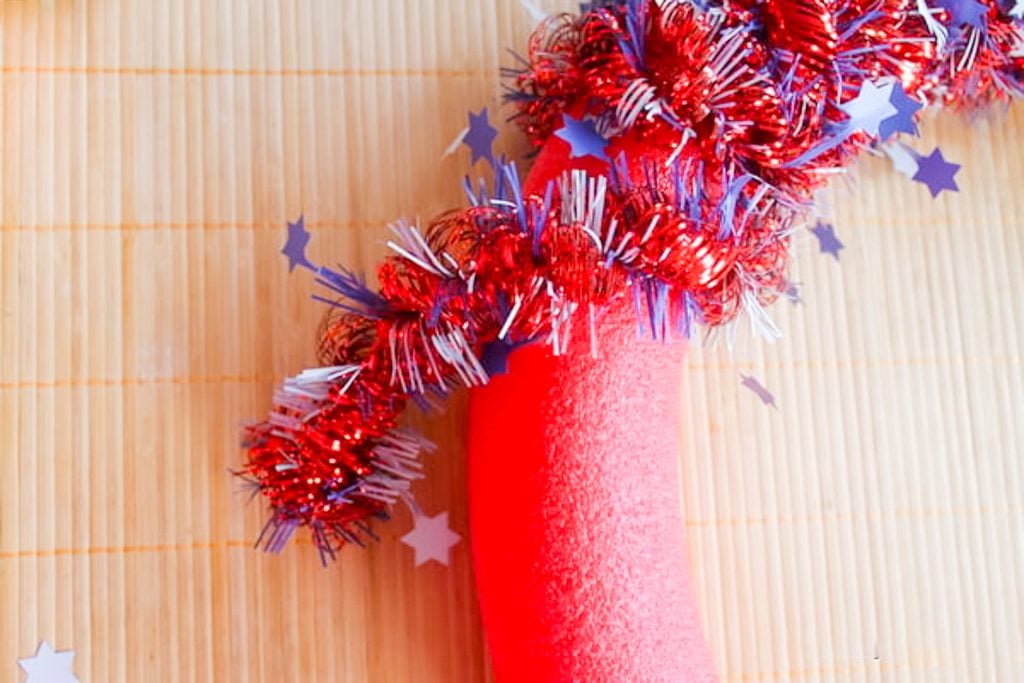 Garland on a pool noodle
