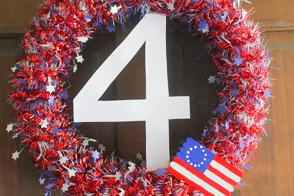 Number 4 placed in the middle of a pool noodle wreath