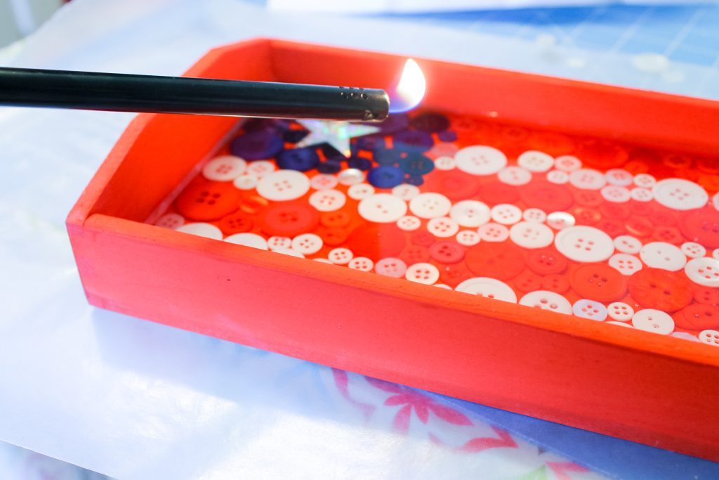 Flame to melt epoxy bubble