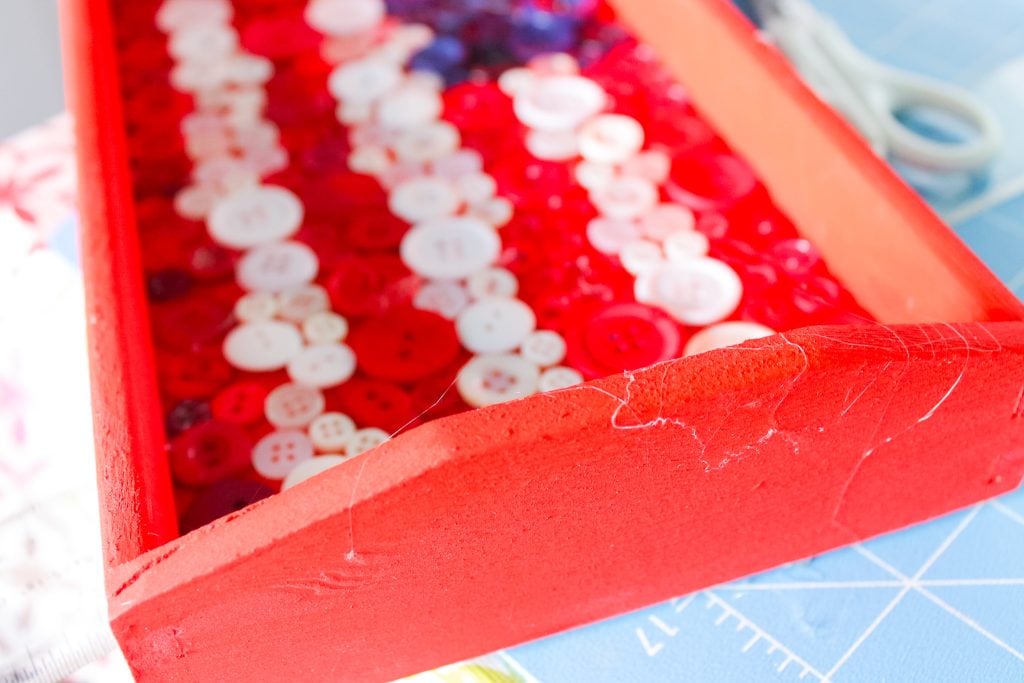 Glue threads on wooden tray