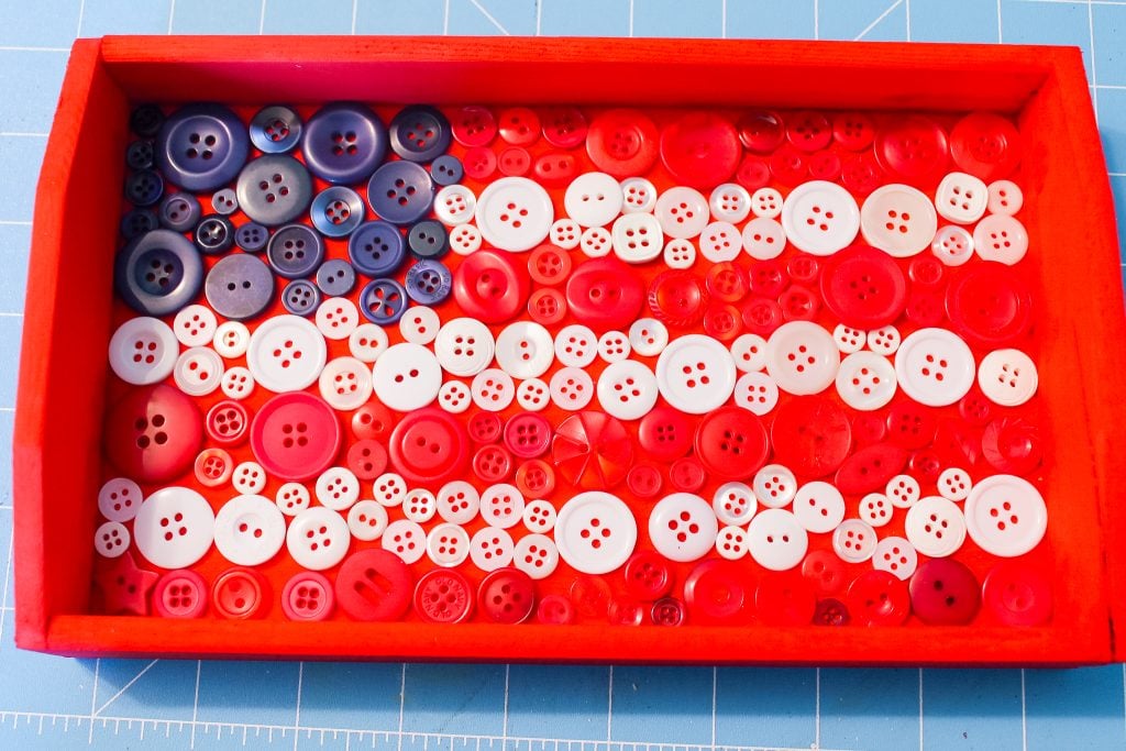buttons in flag pattern on tray
