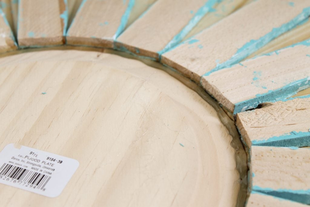 shims attached to wooden round with glue