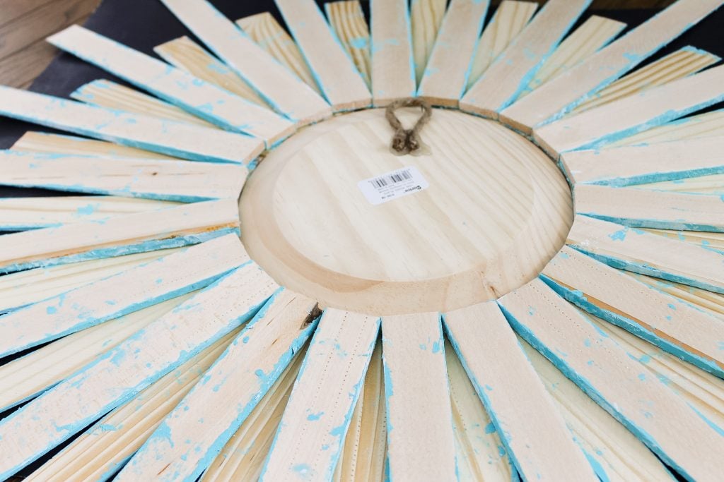 rope hanger added to back of wood round