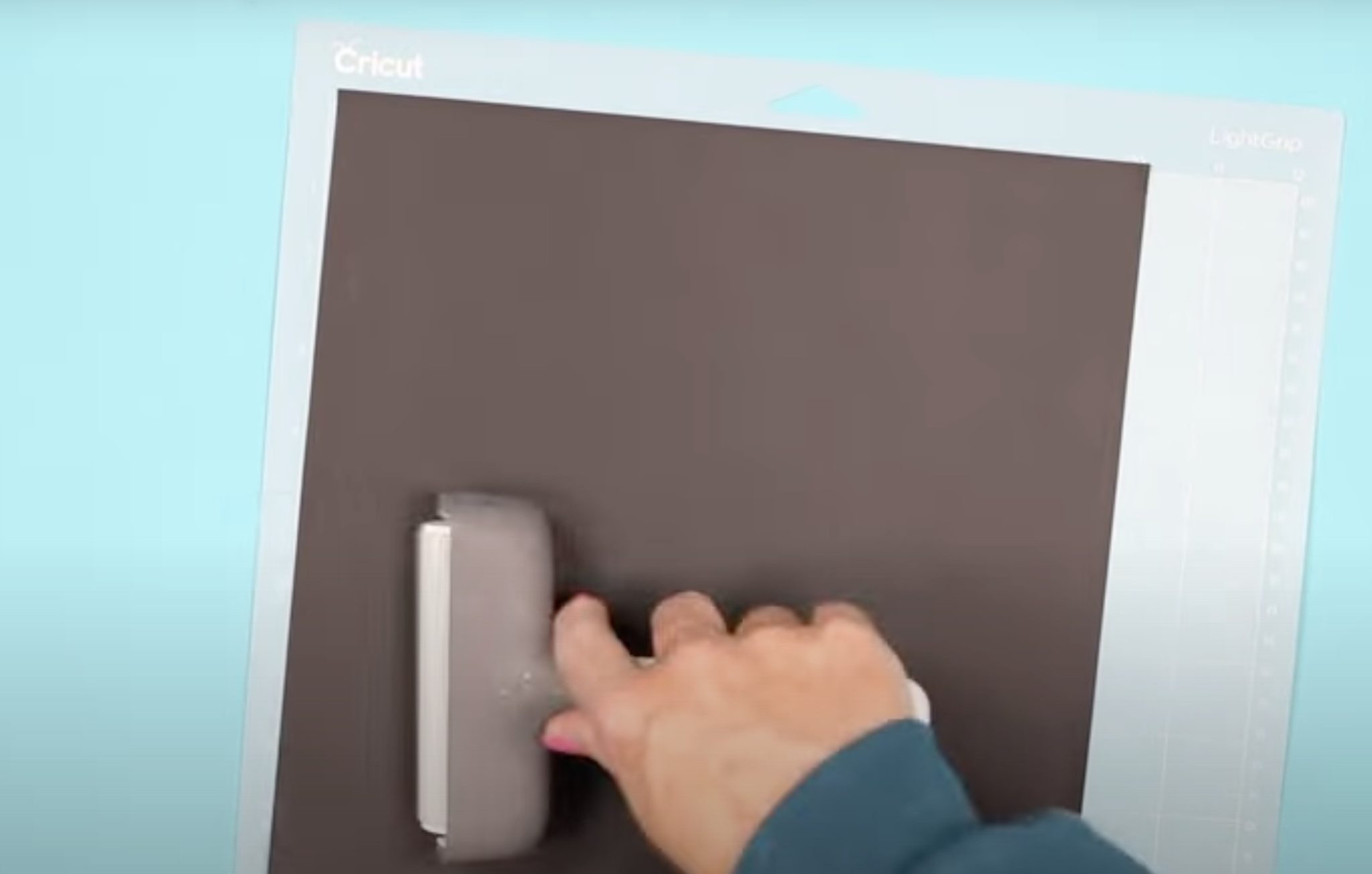 Add HTV to cutting mat glitter side down.