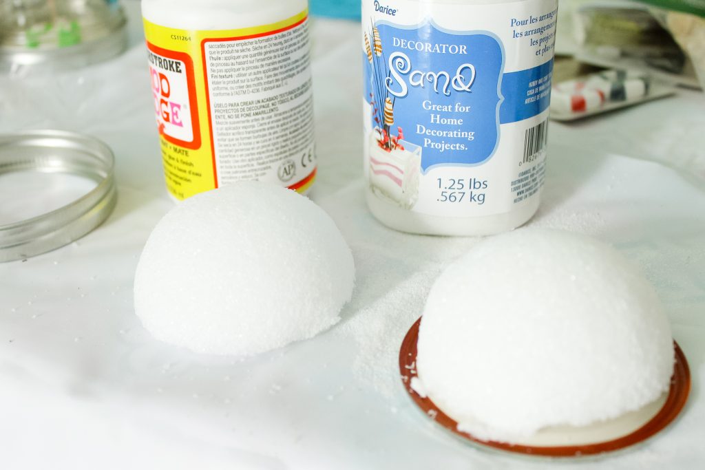 styrofoam ball cut in half and mounted on a jar lid