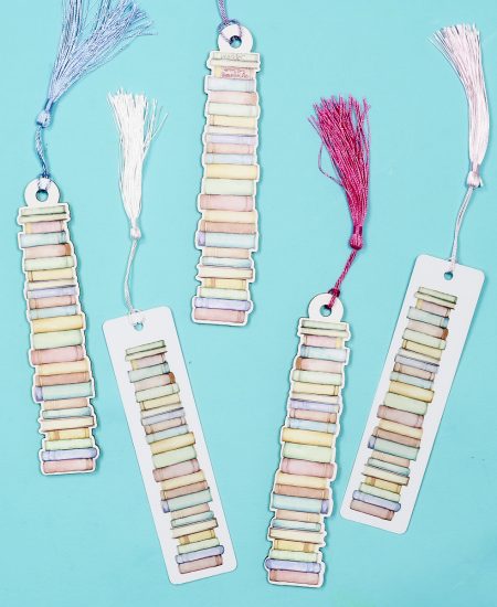 Finished book tracker bookmarks with tassels added.