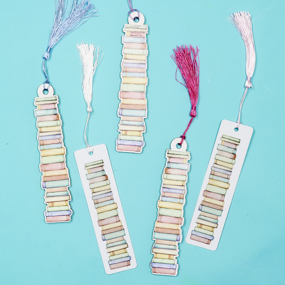 Finished book tracker bookmarks with tassels added.