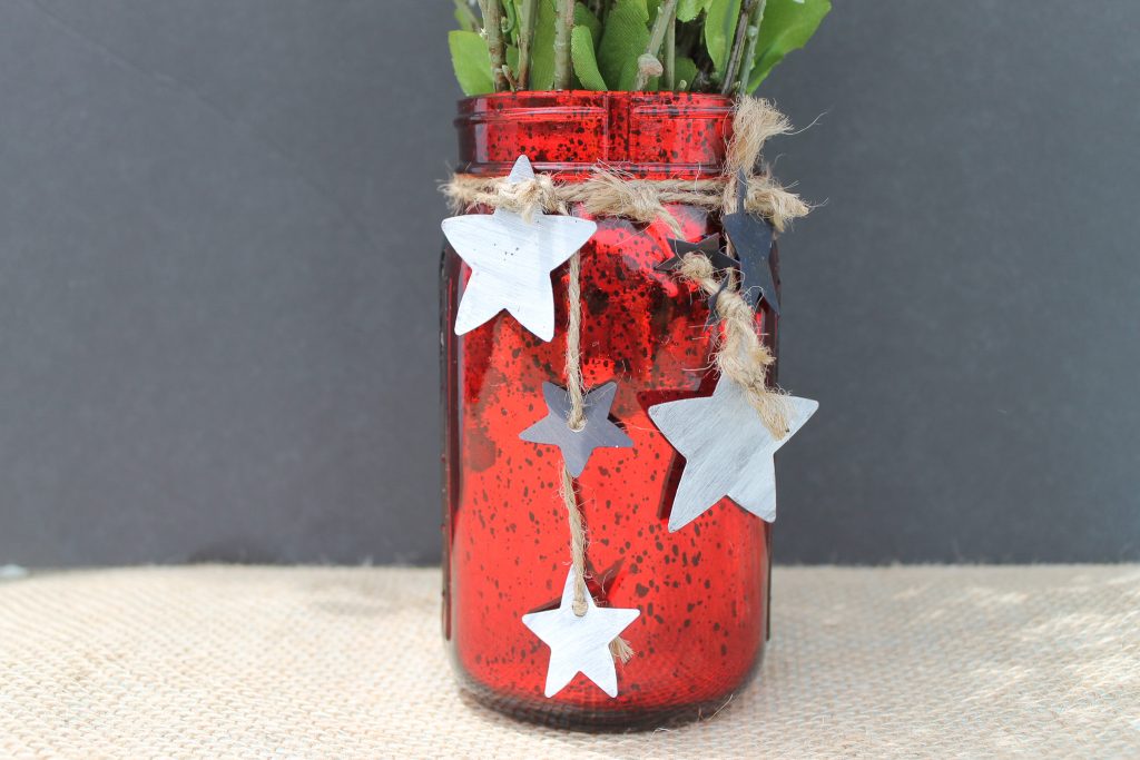 Jar with jute and metal stars