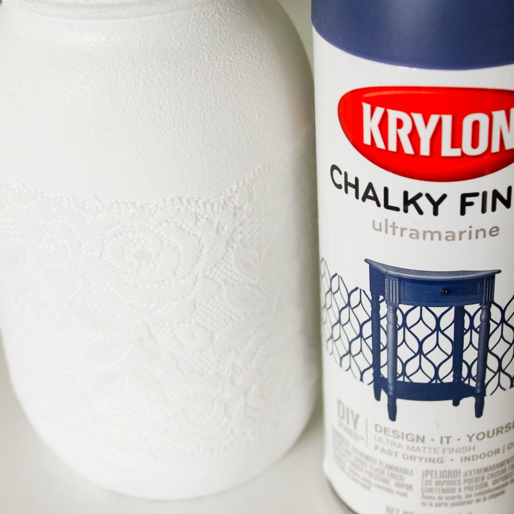 spray painted mason jar with lace overlay