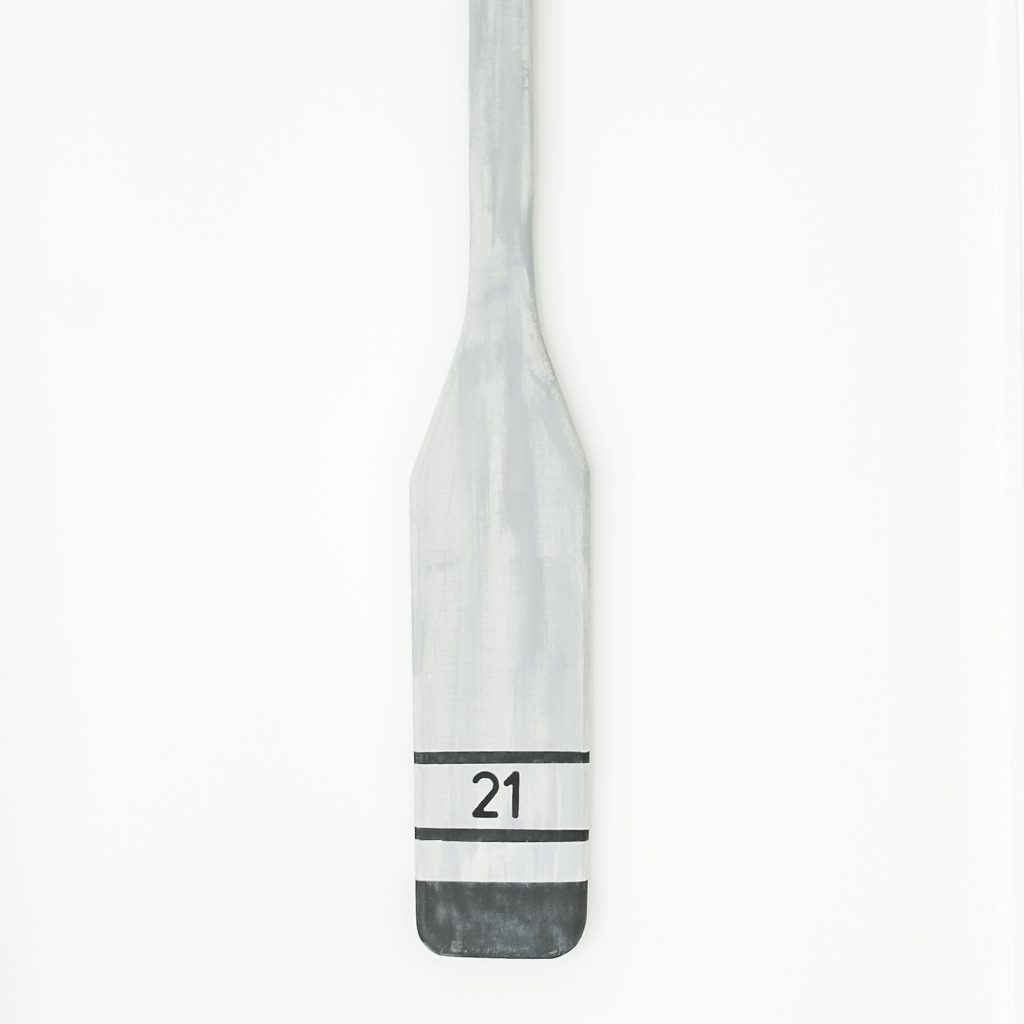 painted and stenciled oar