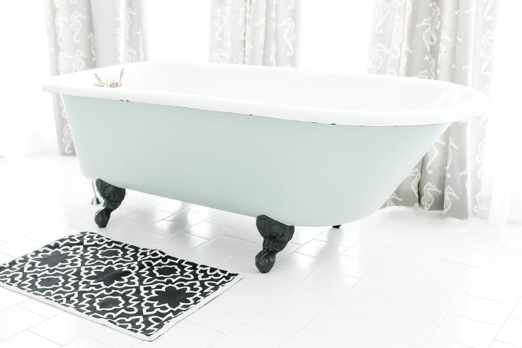 bathtub on white tile floor