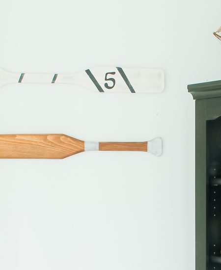 Finished oars on bathroom wall for nautical decor