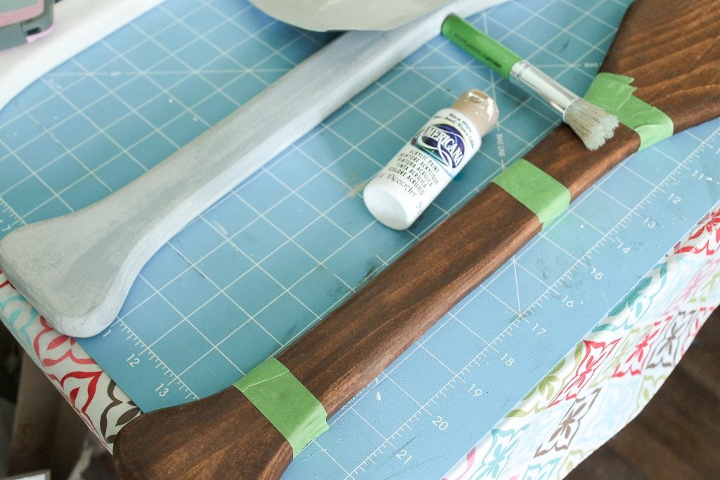 taped oar ready to be painted
