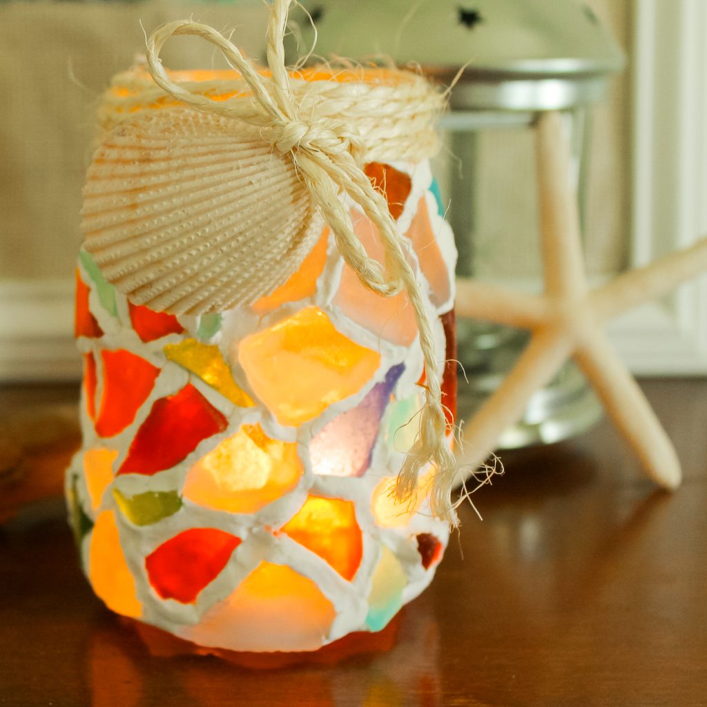 seas glass mason jar with jute and sea shell accent