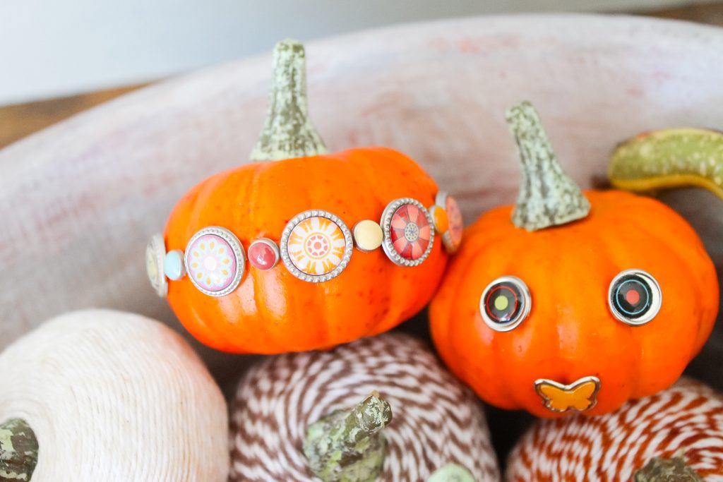 Bradded Pumpkins -- a 5 minute way to update fake or real pumpkins. Just insert brads by pushing! So simple! Click to see a variety of ways to decorate pumpkins with brads. pretty brads added to craft pumpkins