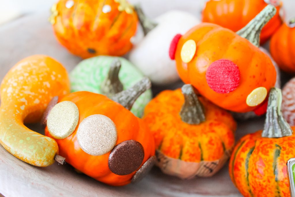 Bradded Pumpkins -- a 5 minute way to update fake or real pumpkins. Just insert brads by pushing! So simple! Click to see a variety of ways to decorate pumpkins with brads. decorative brads added to craft pumpkins