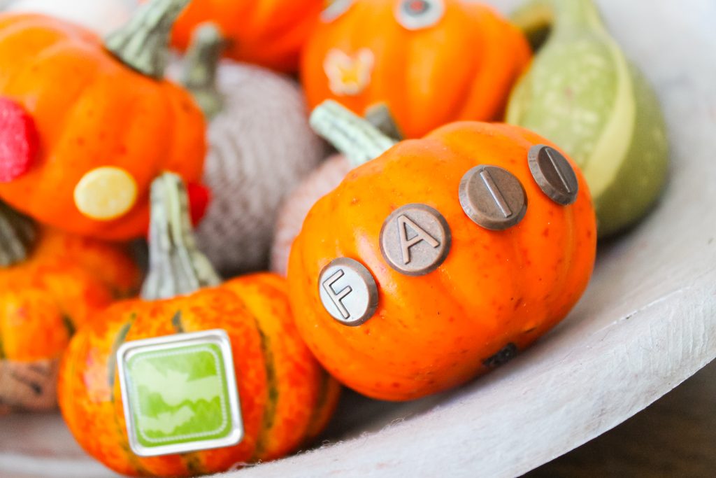 Bradded Pumpkins -- a 5 minute way to update fake or real pumpkins. Just insert brads by pushing! So simple! Click to see a variety of ways to decorate pumpkins with brads. Cute pumpkins with embellishments