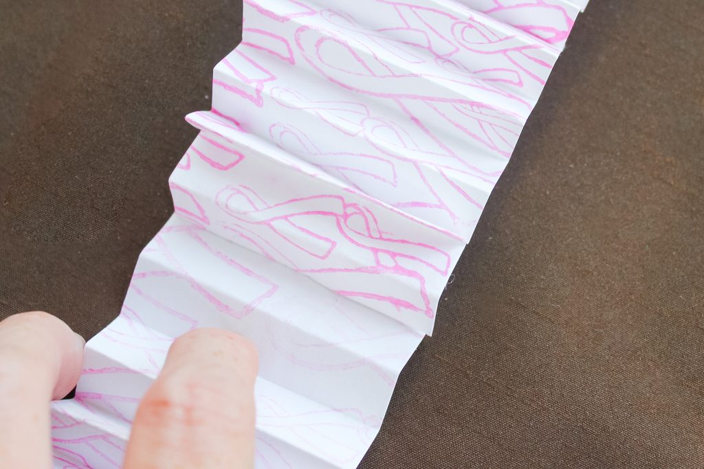 accordian folded stamped paper