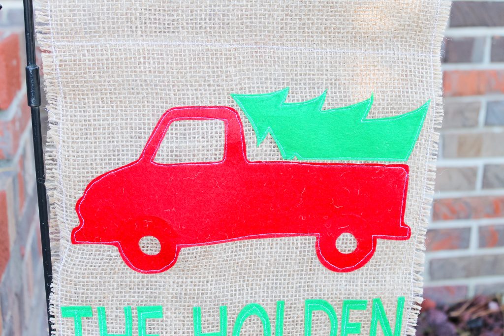 Red felt truck with tree on a burlap garden flag