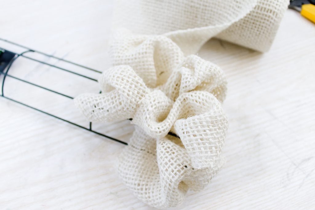 Burlap, ribbon gathered on wire frame