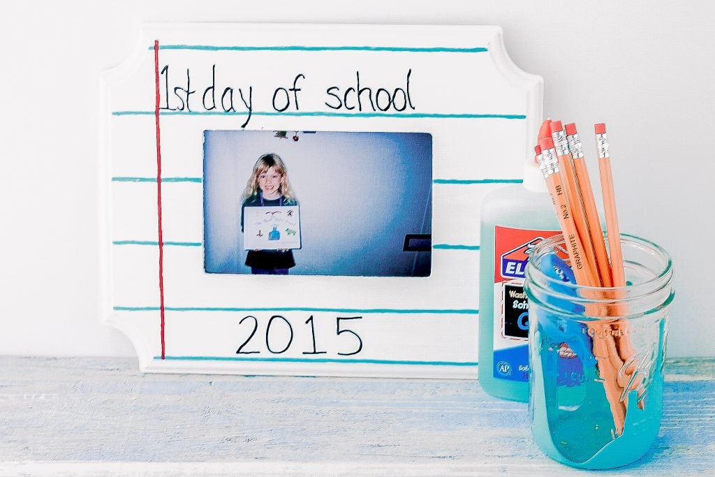 pencils in a mason jar with glue and photo frame