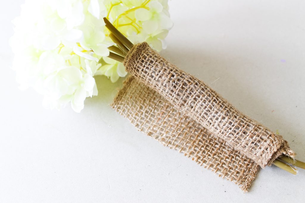 wrapping stems with burlap ribbon