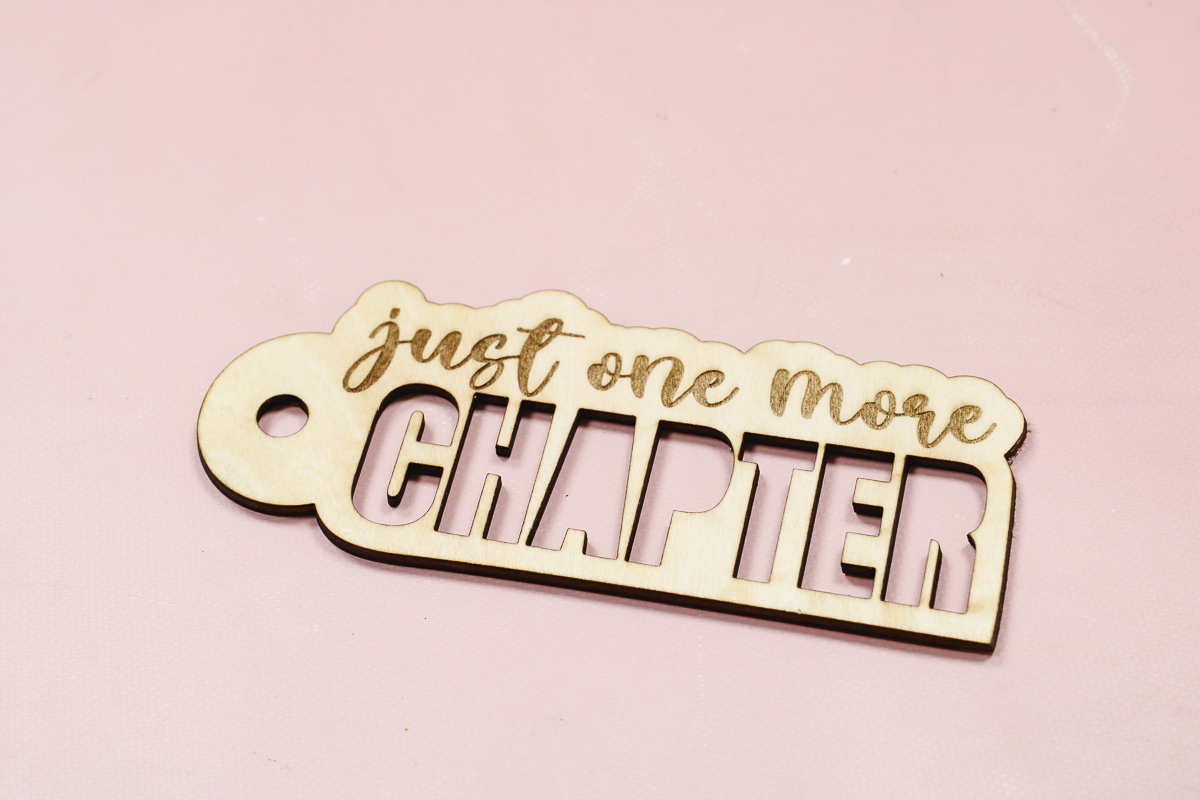 Finished laser cut and engraved wood bookmark.