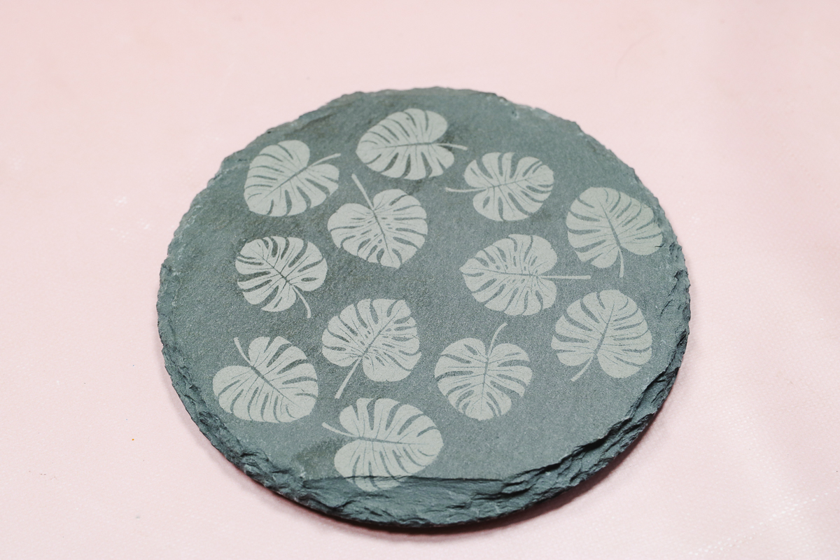 Engraving on slate coaster.