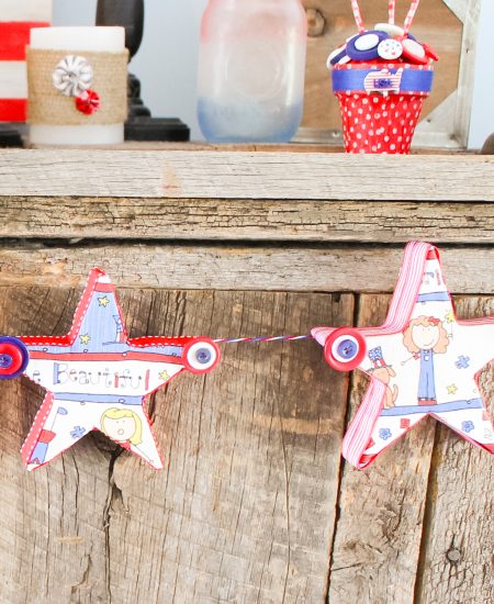 stars and button garland on a mantel