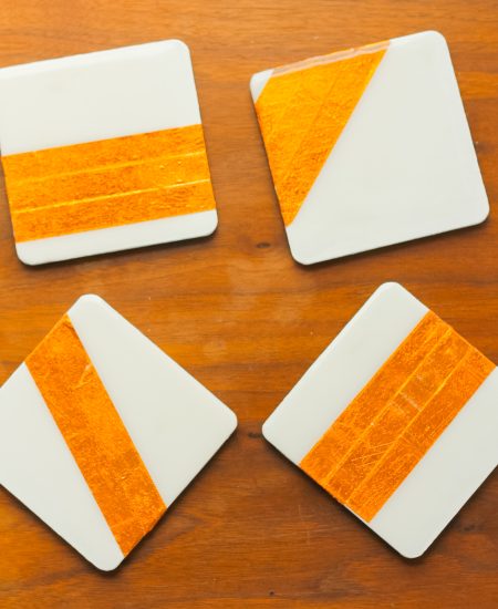 four different coaster with copper foil
