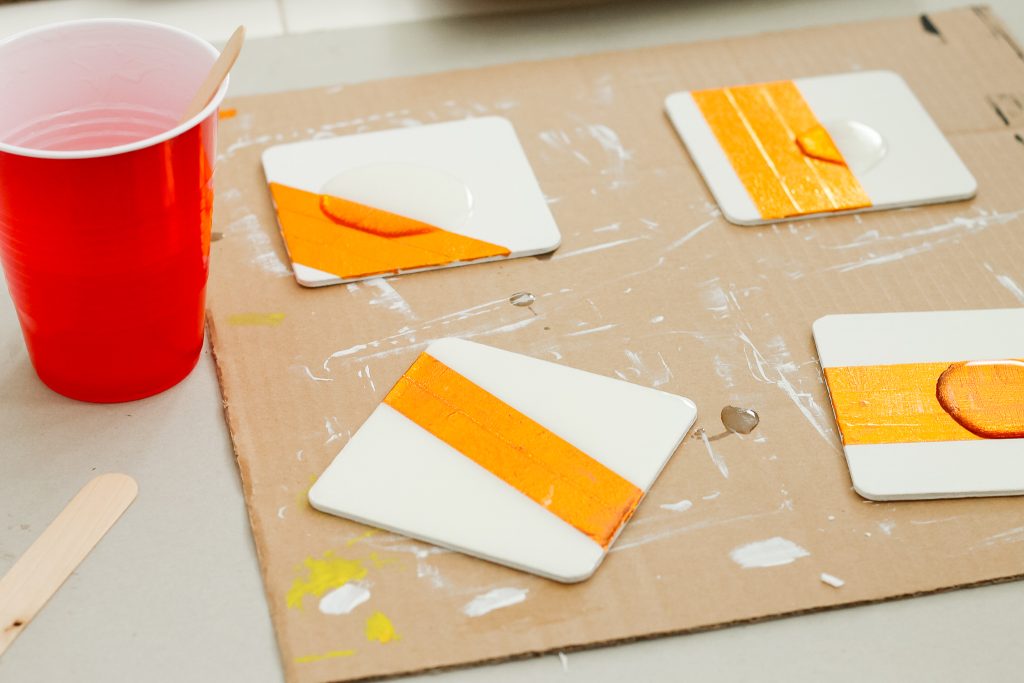 adding epoxy to the top of embellished coasters