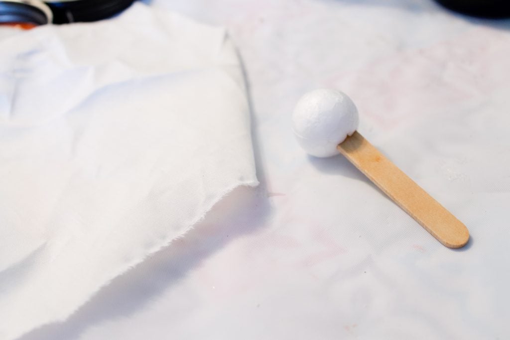 craft stick with a foam ball for ghost form