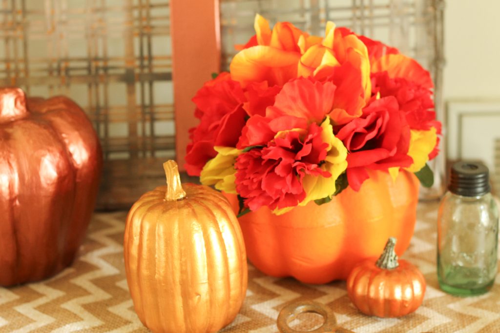 Pumpkins with flowers and paint