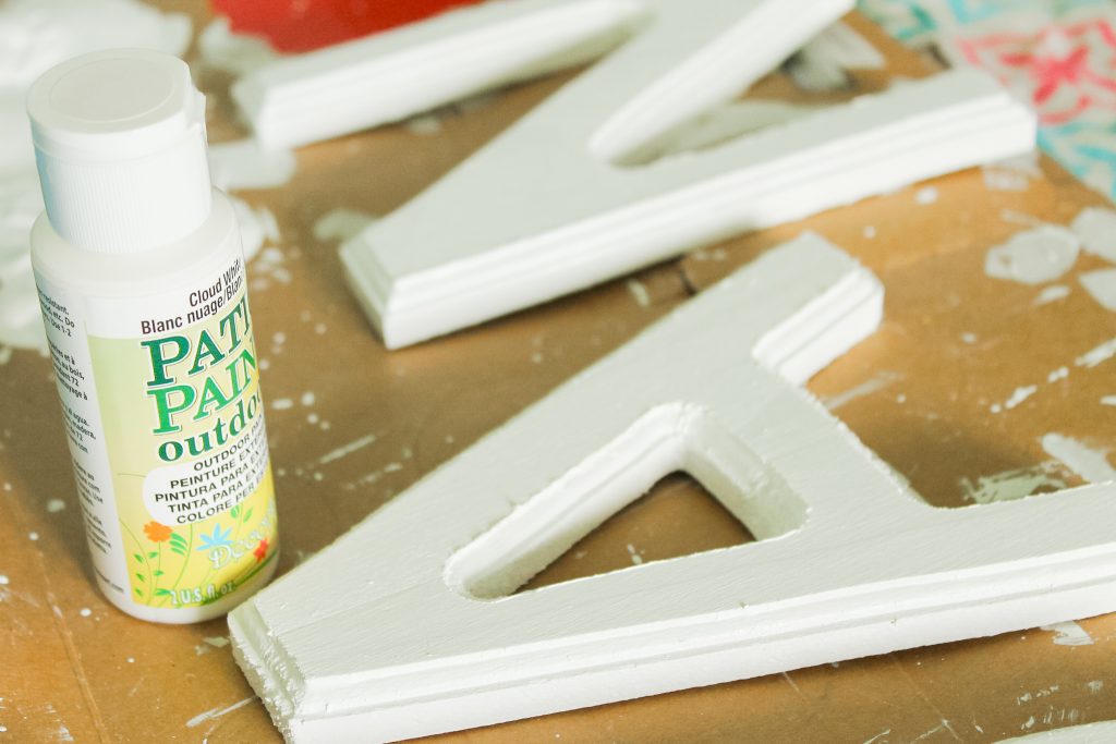 outdoor paint on a wooden letter