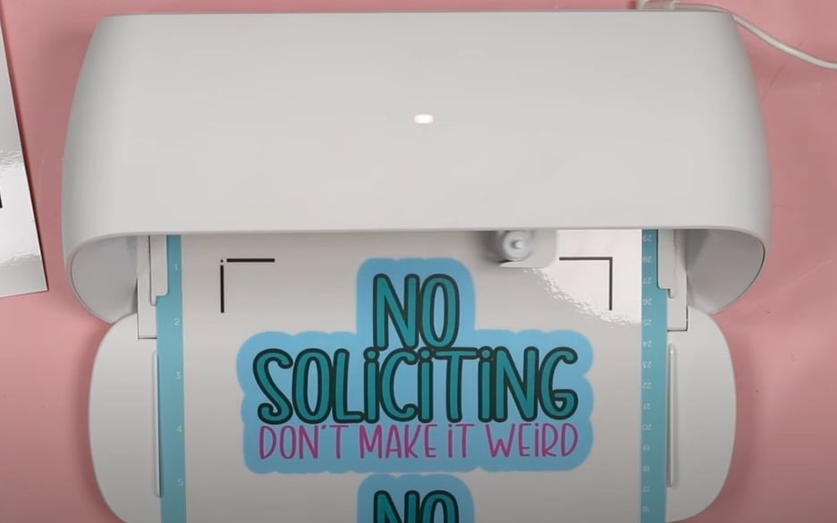 Load mat into Cricut machine.