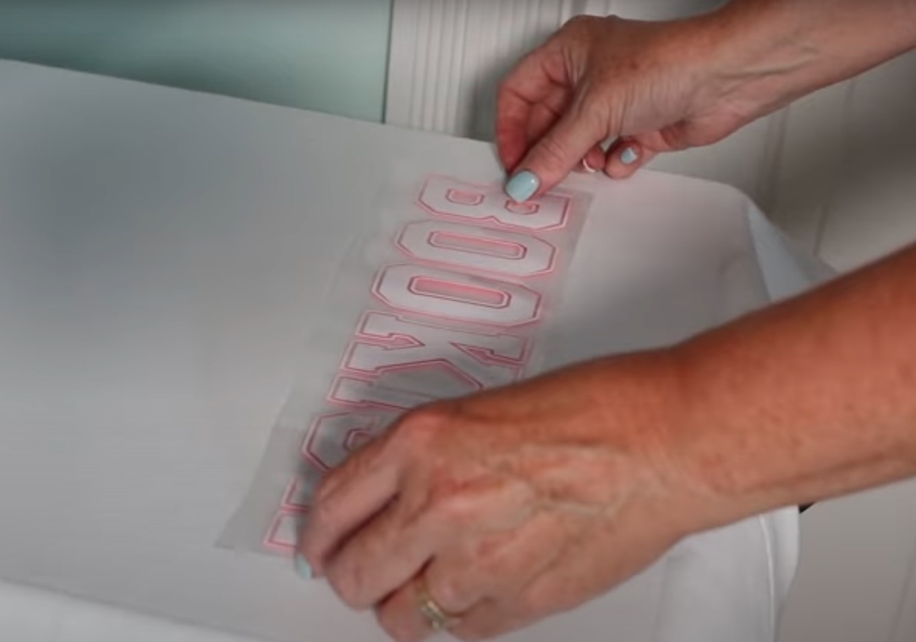 Locate the material on the blank and press.