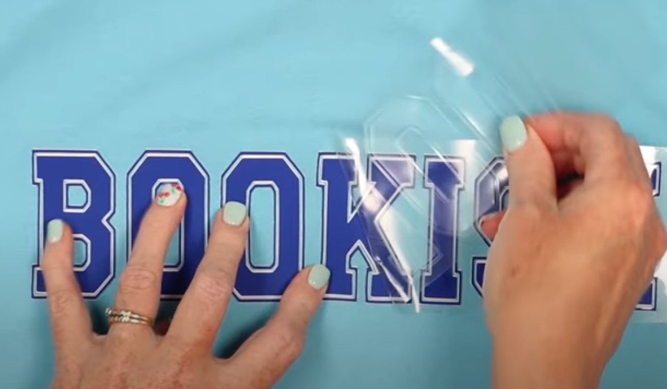 Peel carrier sheet away from Super Pop HTV.