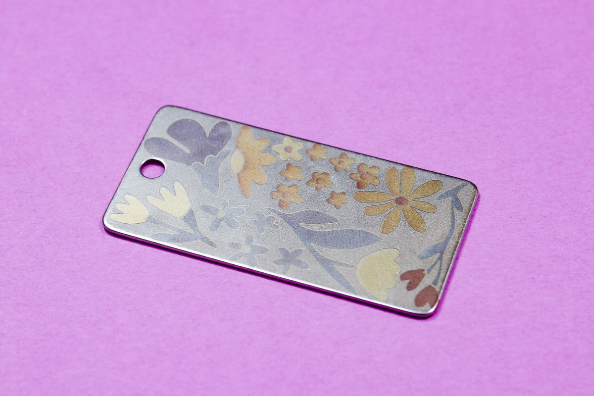 Finished color metal engraving keychain.