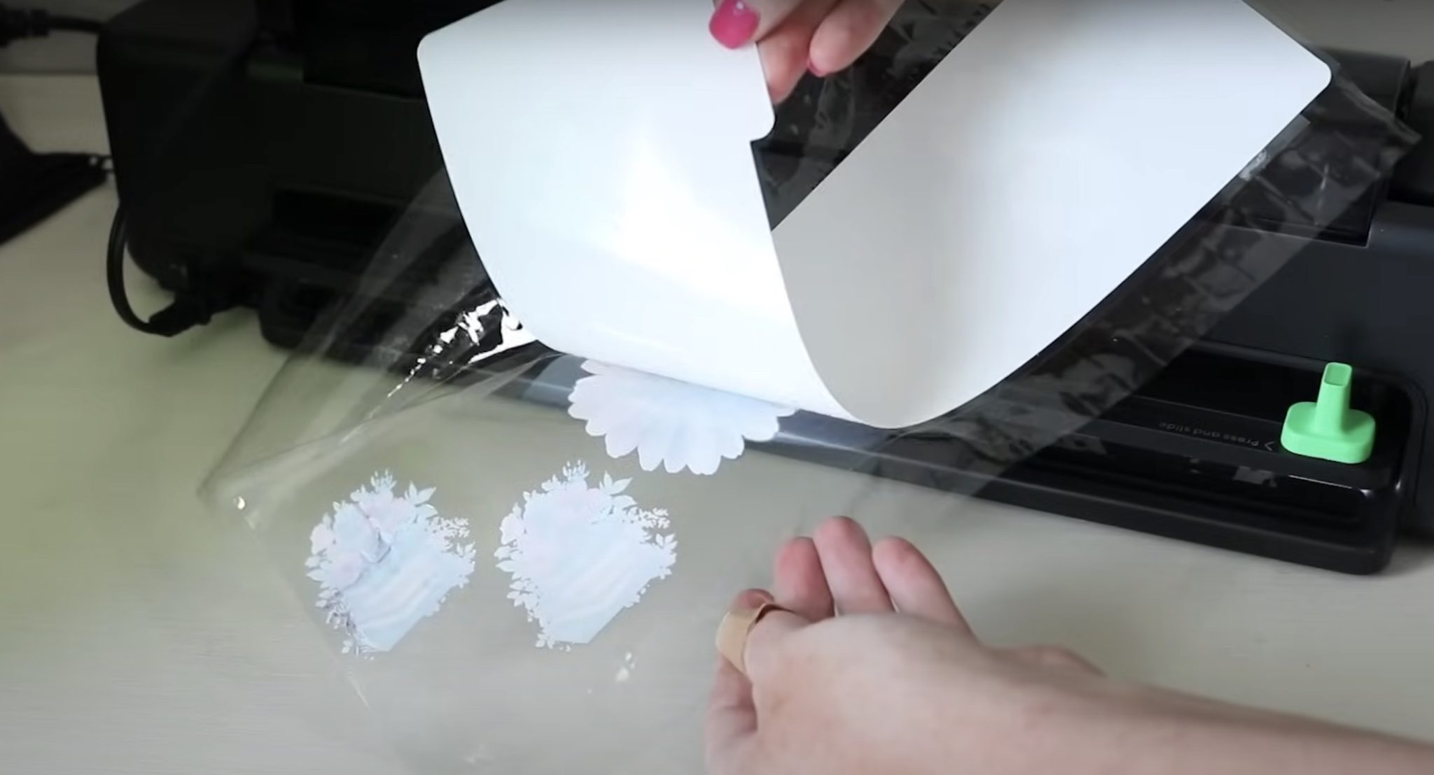 Remove white mat from the back of the stickers.