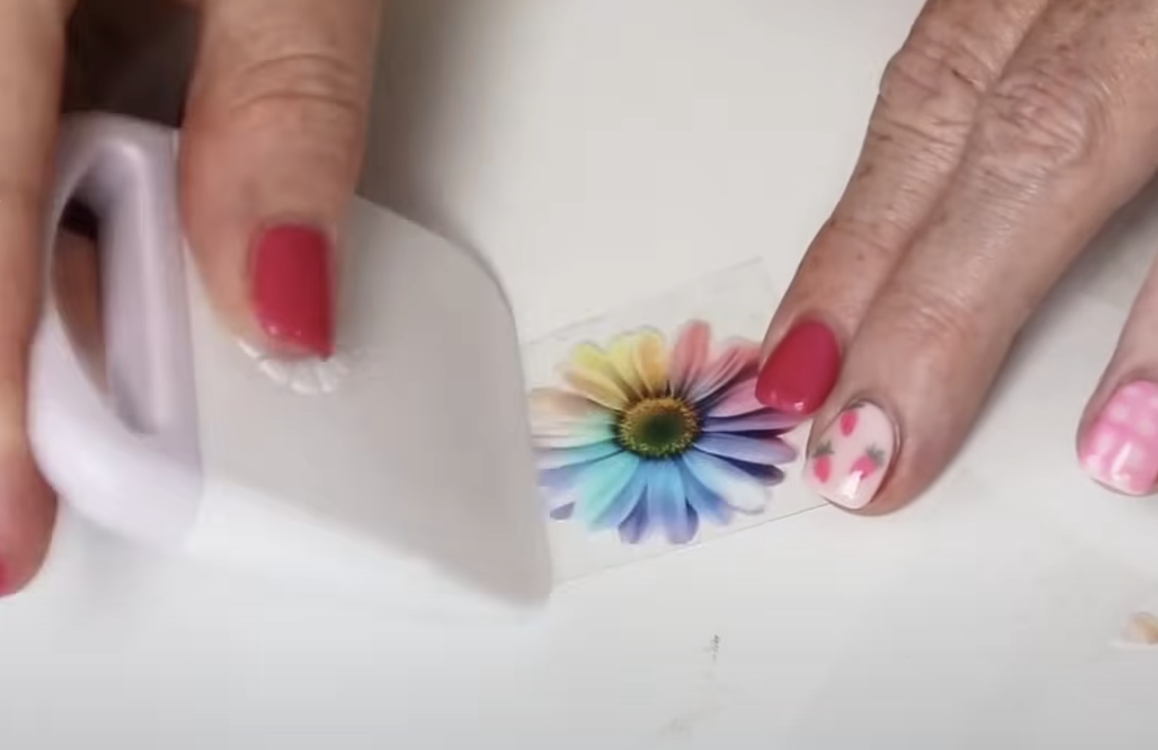 Burnish stickers to remove backers.