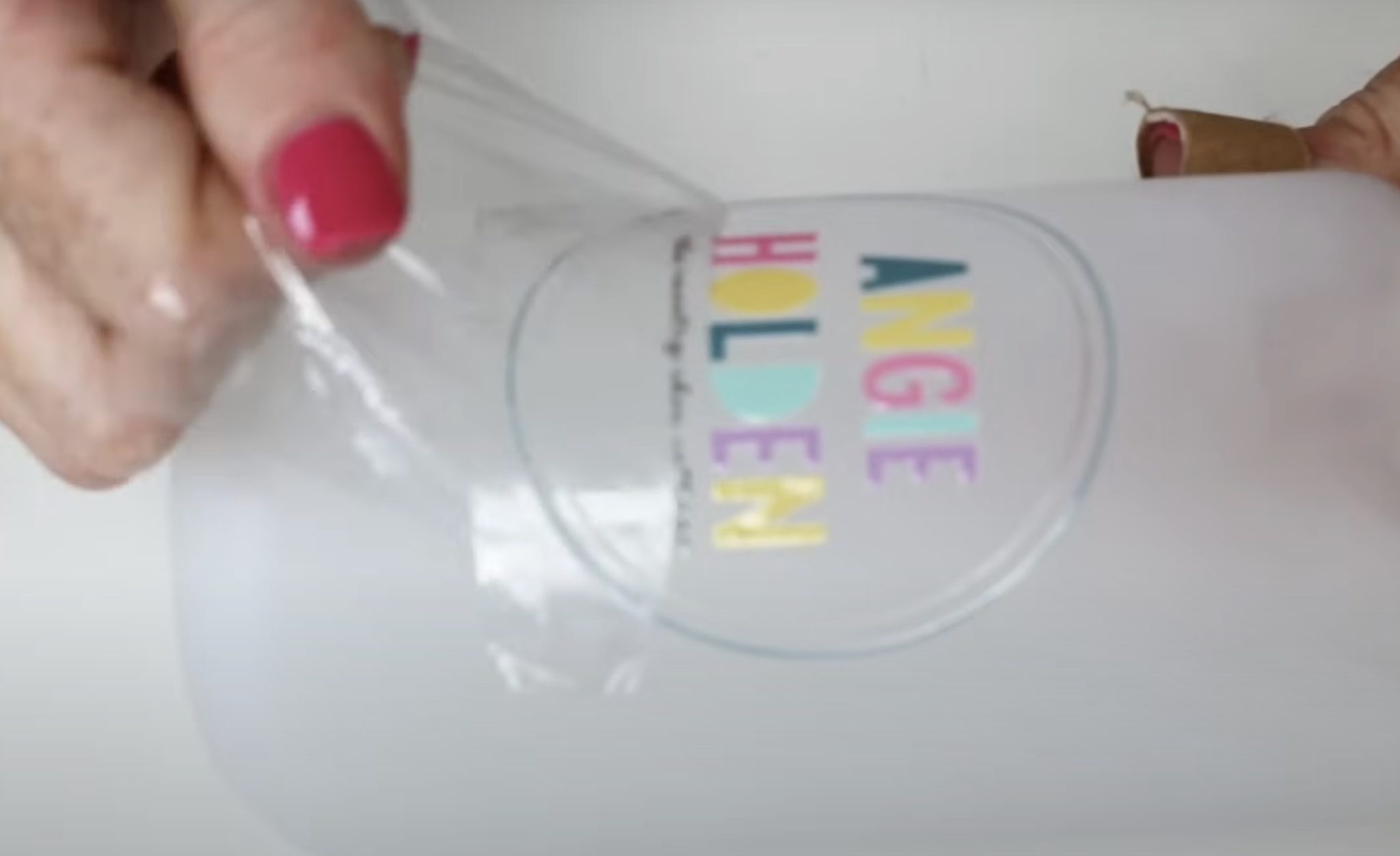 Burnish sticker and remove carrier sheet.